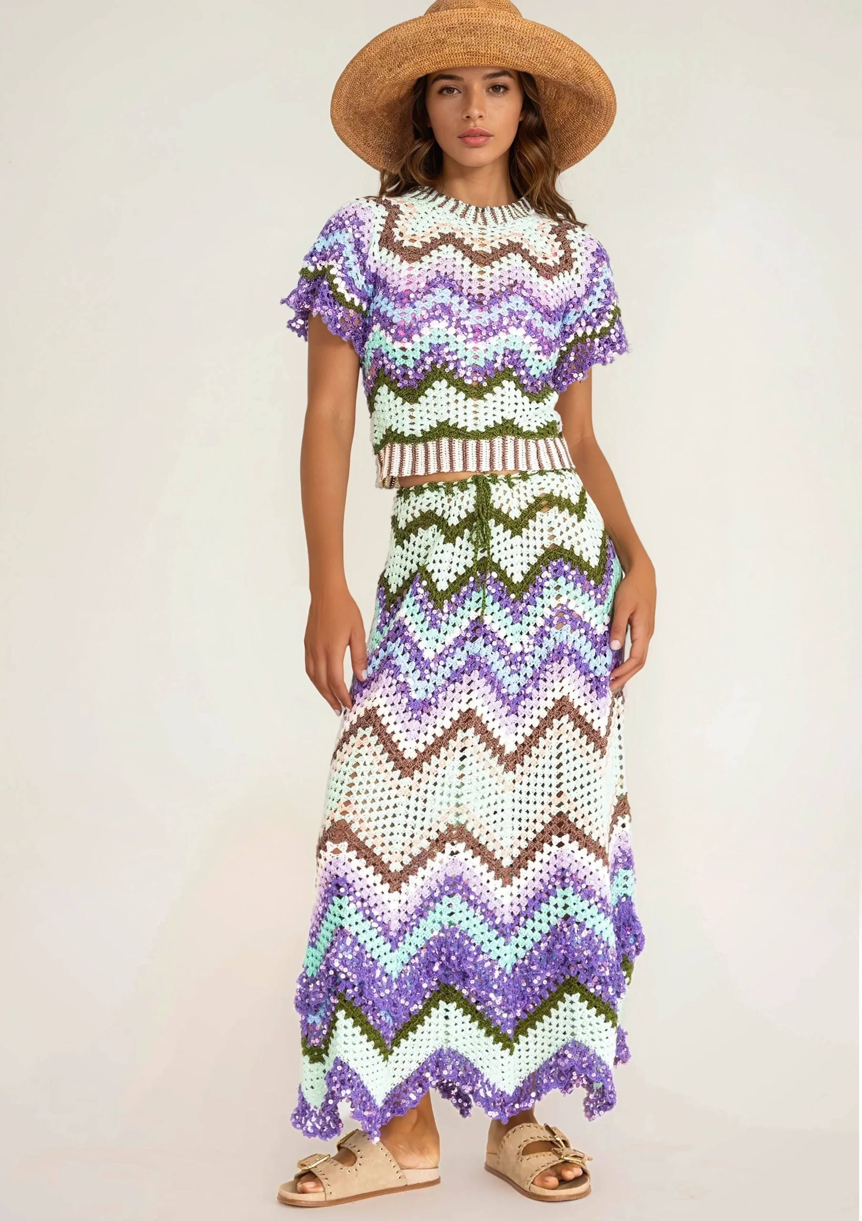 A girl in a handcrocheted top and skirt with zigzag pattern