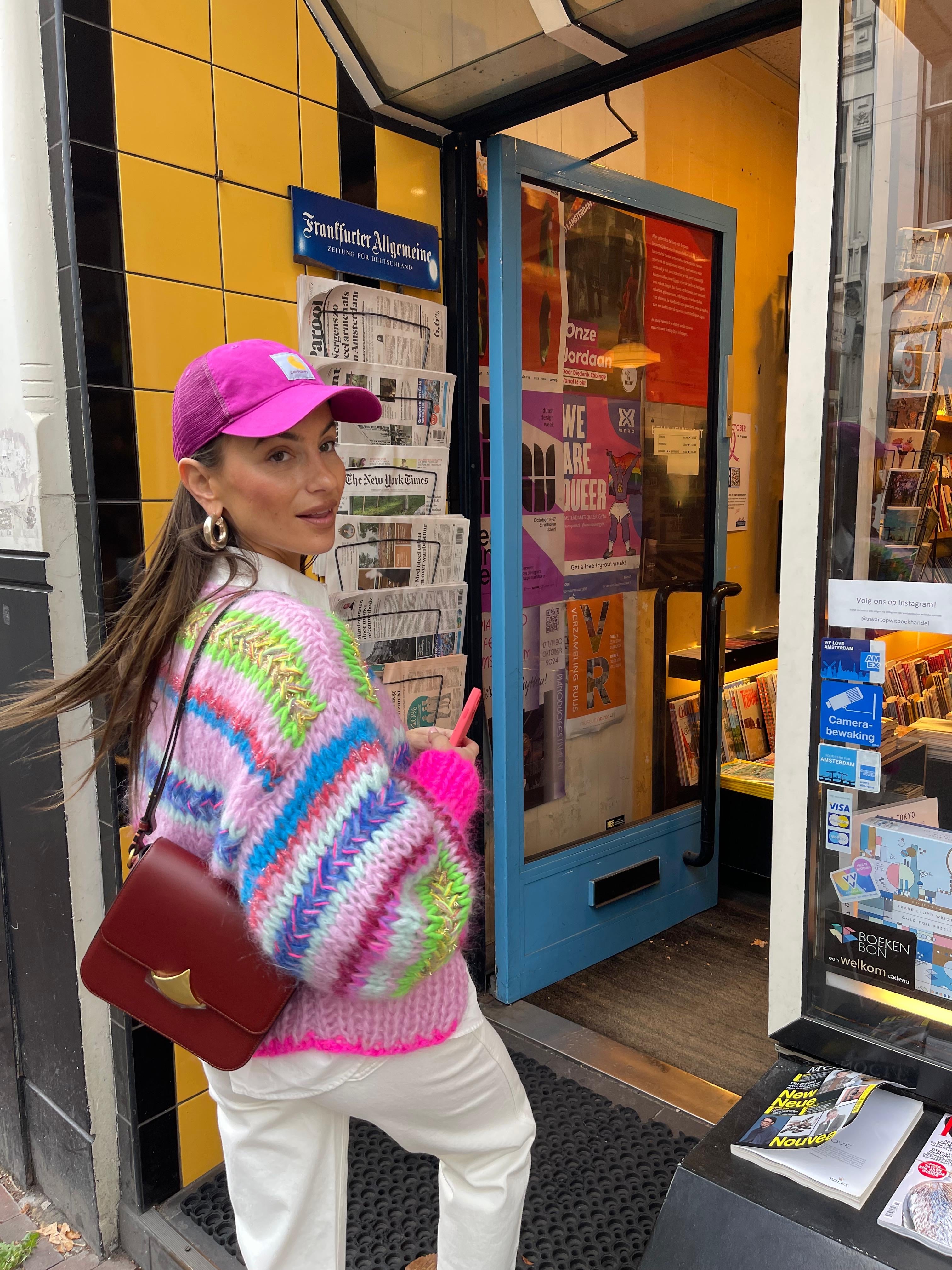 Lizzy van der ligt in a pink striped highend luxury handknitted jacket